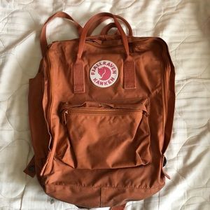 Orange Fjallraven Kanken backpack